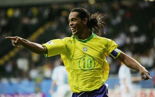 Ronaldinho celebrates scoring against Argentina in the Confederations Cup final